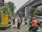 Polsek Kelapa Gading Gelar Jumat Peduli, Bagikan 50 Nasi Kotak untuk Ojol dan Warga