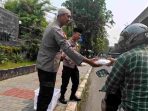 Polsek Kelapa Gading Gelar Jumat Peduli, Bagikan 50 Nasi Kotak untuk Ojol dan Warga Polsek Kelapa Gading Gelar Jumat Peduli, Bagikan 50 Nasi Kotak untuk Ojol dan Warga