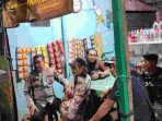 Unit Reskrim Polsek Jatisampurna Gelar Sambang dan Himbauan Kamtibmas kepada Warga serta Juru Parkir di Kawasan GOR Kranggan