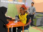 Polsek Kelapa Gading Gelar Pengobatan Gratis Sambut HUT Bhayangkara ke-80, Puluhan Warga dan Ojol Antusias Ikut Pemeriksaan Kesehatan